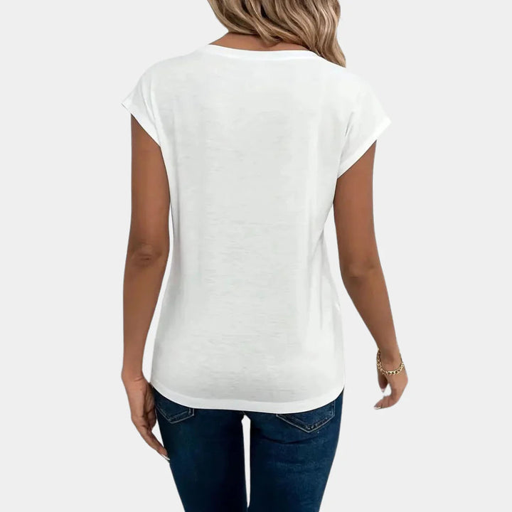 Stijlvolle witte dames V-hals top, ultiem comfort voor elke dag. Ideaal als basis top voor lente/zomer.