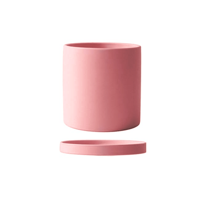 Moderne keramische bloempot met schotel, ideaal voor binnen. Stijlvolle woondecoratie.