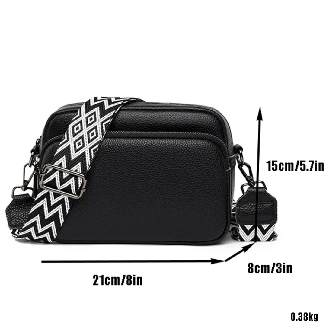 Messenger tas dames leer, compact en stijlvol, met verstelbare schouderriem.