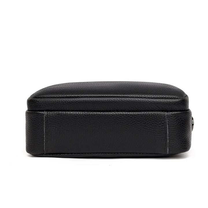 Compacte dames leren tas, stijlvol en functioneel als messenger tas.