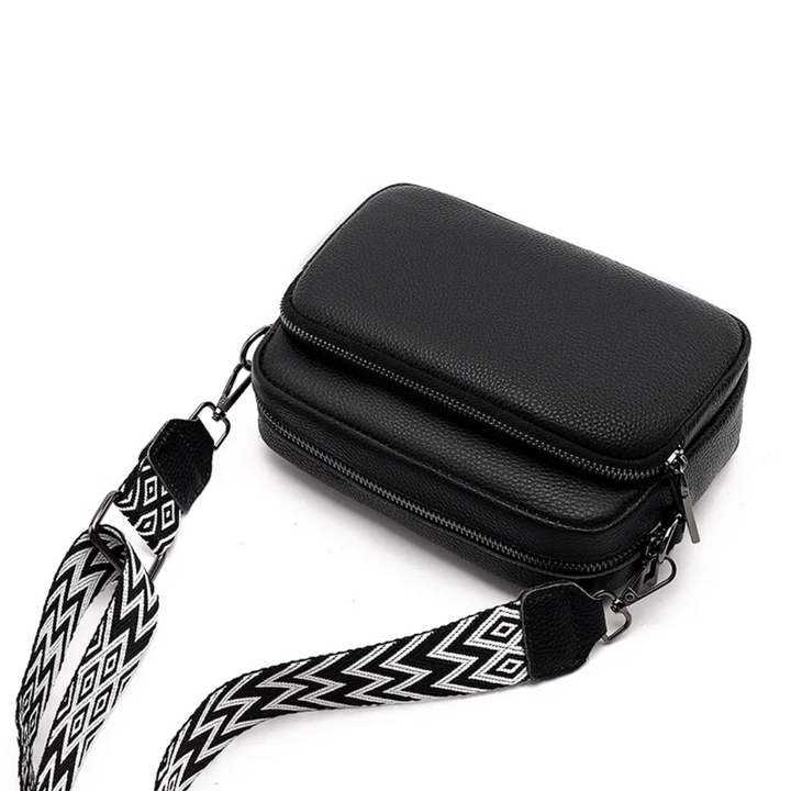 Praktische echt leren handtas, ook te dragen als crossbody of schoudertas.
