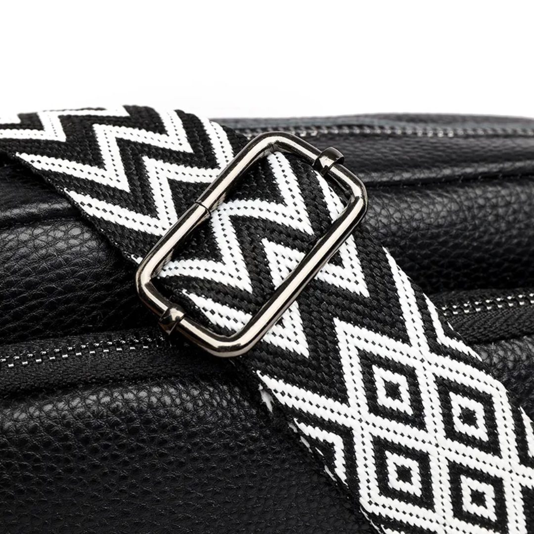 Vrouwen leren schoudertas, in een compact en praktisch messenger design.