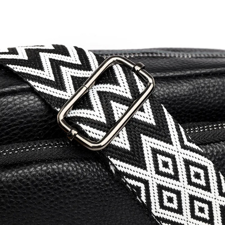 Vrouwen leren schoudertas, in een compact en praktisch messenger design.
