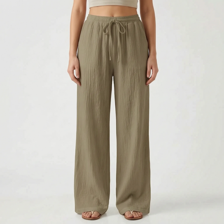 Veelzijdige dames palazzo broek met wijde pijpen, elastische taille en trekkoord, makkelijk te combineren.