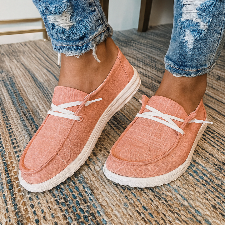 Stijlvolle casual dames veterschoenen. Plat, ademend design voor dagelijks gemak. Beschikbaar in grijs, zwart, wit.