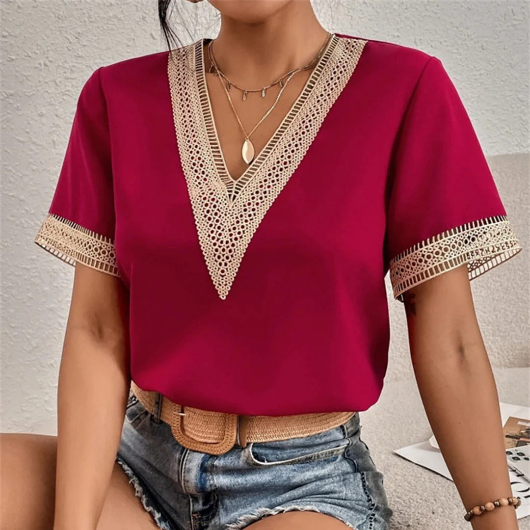 Elegante damesblouse met stijlvolle V-hals en lange mouwen, perfect voor een chique look.