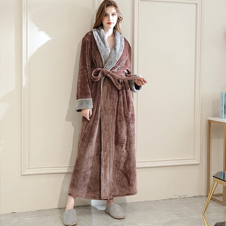 Comfortabele effen dames badjas van zachte stof, perfect voor loungewear en warmte.