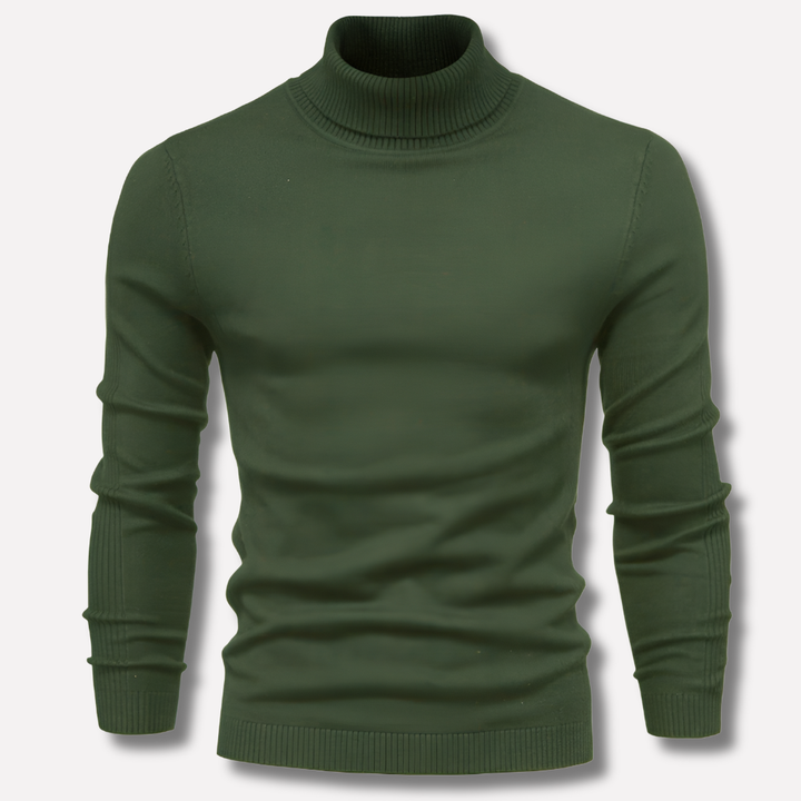 Man draagt stijlvolle slim fit heren coltrui, gecombineerd met jeans voor een comfortabele casual winterlook.
