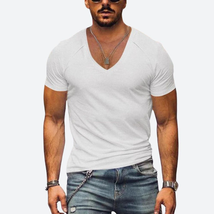 Mannen ademend zomershirt met korte mouw en ronde hals, ideaal voor comfortabele zomerkleding. Stijlvol en fris.