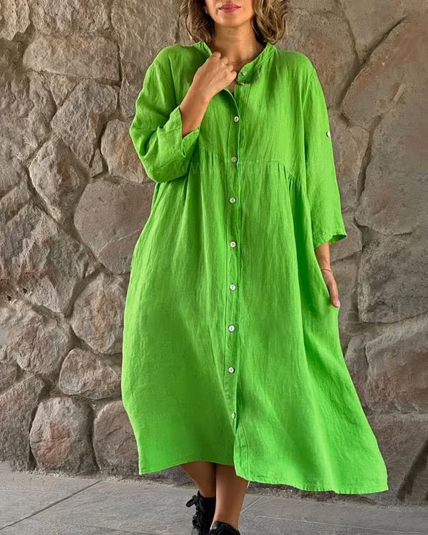 Elegante groene midi zomerjurk voor dames met flatterend silhouet, 3/4 mouwen en decoratieve knoopjes, ideaal voor casual.