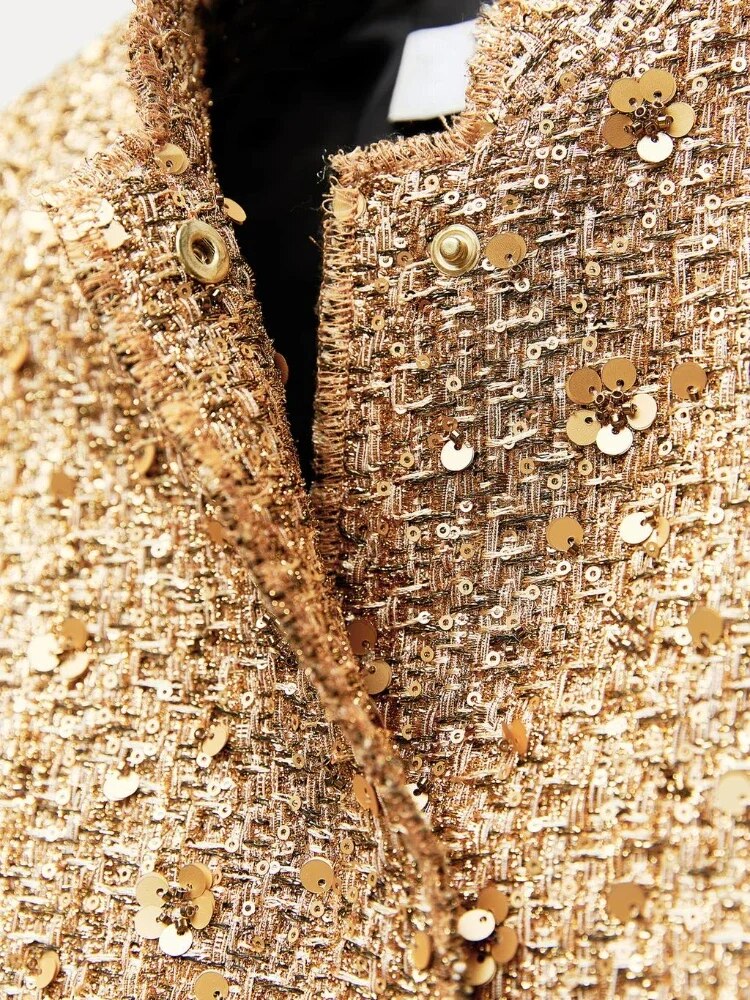 Comfortabele oversized dames glitterjas, kort model met kraag. Geschikt voor zowel feestjes als chique dagelijkse outfits.