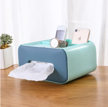 Praktische bureau organizer met geïntegreerde tissuehouder voor een geordende werkplek; gemaakt van plastic/hout.