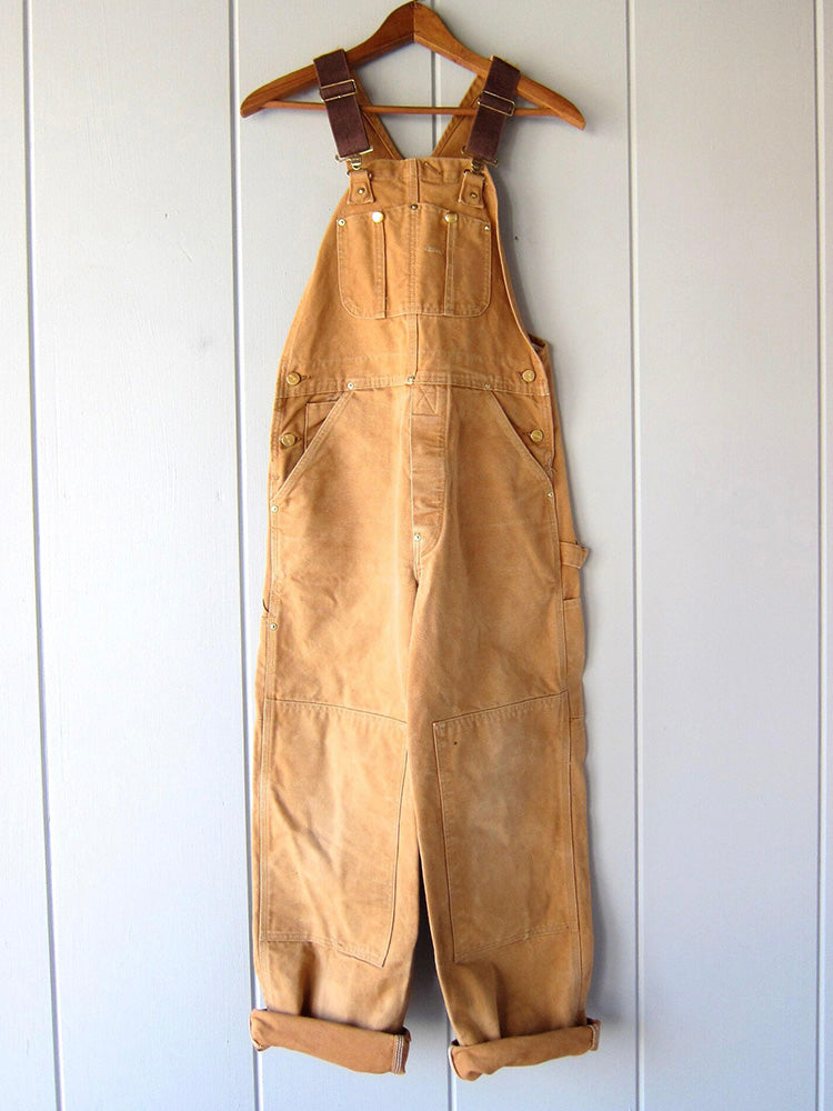 Stevige unisex werkoveralls van duurzaam canvas katoen. Perfect voor ambacht, tuinieren en intensief gebruik.