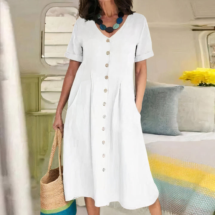 Luchtige katoen-linnen dames zomerjurk, losvallend en comfortabel voor warme dagen.