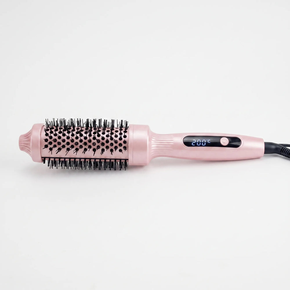 Professionele elektrische föhnborstel voor moeiteloze haarstyling; creëert perfecte, pluisvrije krullen.