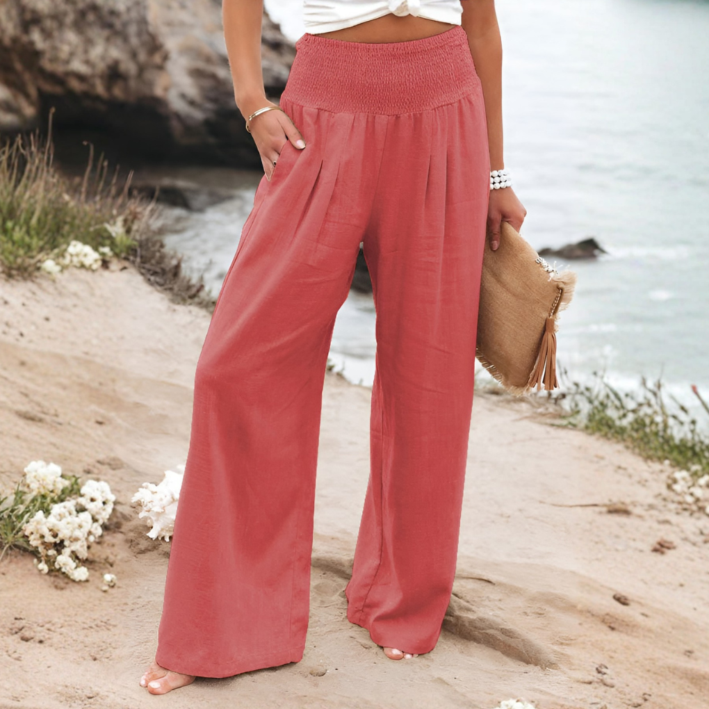 Dames casual linnen palazzo broek met hoge taille. Comfortabel breedbeen design, ideaal voor de zomer.