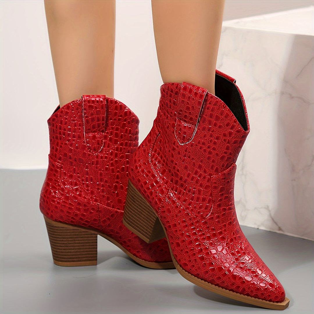 Stijlvolle dames enkellaarzen met spitse neus en stoere blokhak, ideaal voor elke outfit.