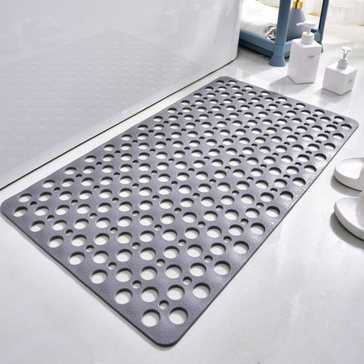 Comfortabele blauwe sneldrogende antislip badmat met zuignappen, verhoogt veiligheid in de douche.