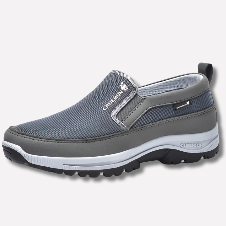 Blauwe slip-on heren wandelschoenen, waterdicht en orthopedisch voor comfortabele ondersteuning bij elke stap.