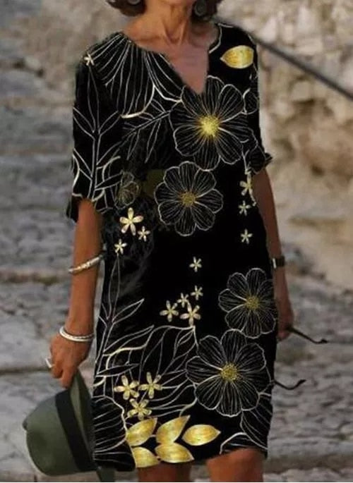 Stijlvolle dames midi zomerjurk, perfect als elegante jurk voor zomerkleding en casual dagen.