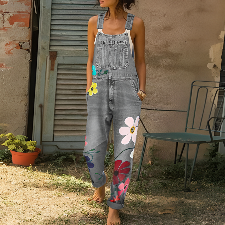 Comfortabele denim dames jumpsuit met bloemenprint en ritssluiting, een veelzijdige en complete outfit.