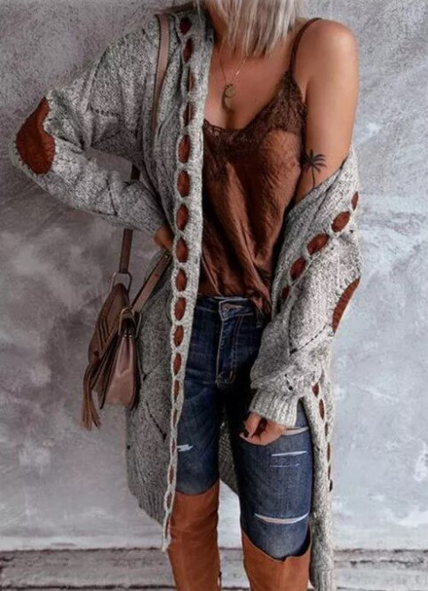 Warm en zacht damesvest met capuchon, lang model voor extra comfort en stijlvolle laagjes.