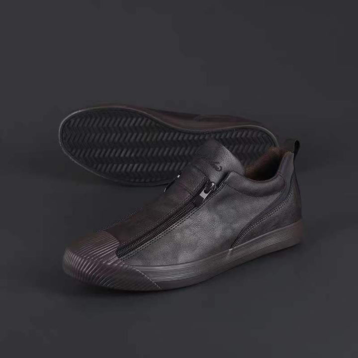 Zij-aanzicht van de heren sneakers Noah met rits, strak design en comfortabele pasvorm.