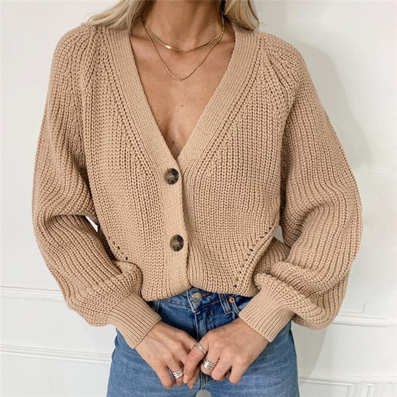 Stijlvol dames geknoopt vest met lange mouwen, losse pasvorm. Comfortabele casual damesmode, effen kleur.