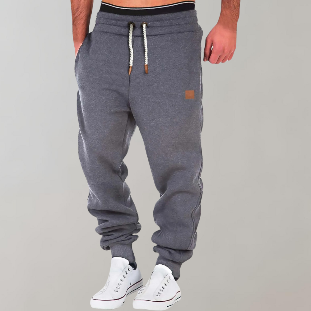 Sportieve heren VHM joggingbroek, modern design, ademend en comfortabel voor training of dagelijks.