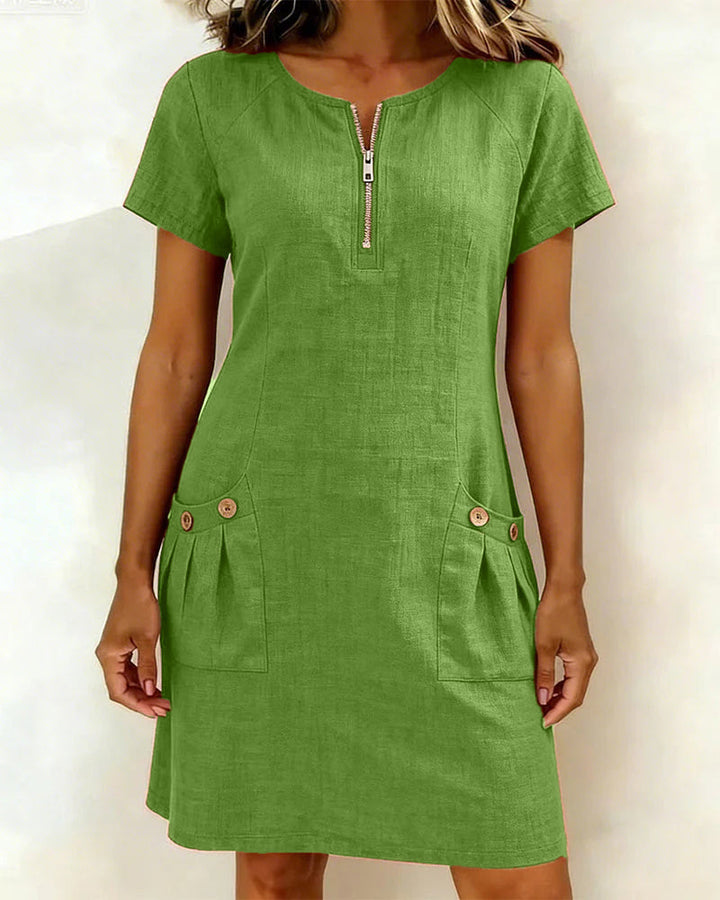 Flatterende A-lijn jurk dames, met elegante ritssluiting en korte mouw. Biedt comfort en stijl voor elke gelegenheid.