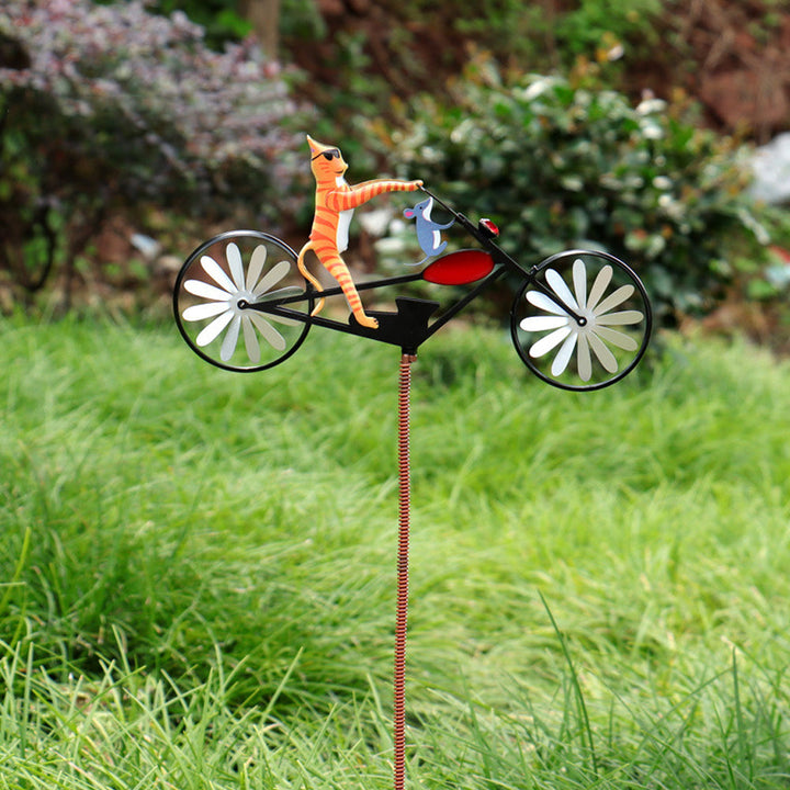 Cadeau tuin: vrolijk windmolentje tuindecoratie met fietsend dier, uniek tuinaccessoire voor elke tuinliefhebber.