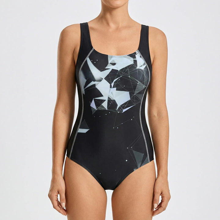 Creëer een gestroomlijnd silhouet met dit corrigerende eendelige dames badpak, zomerklaar.