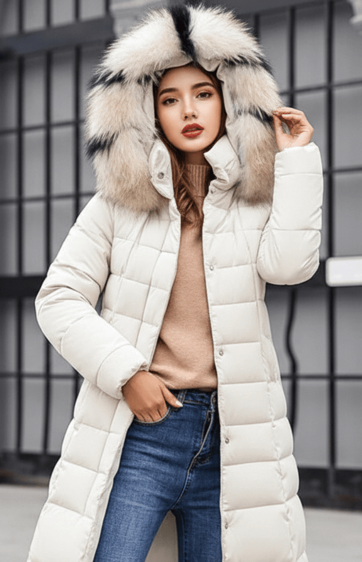Dames lange gewatteerde winterjas Natalie met capuchon, elegant en warm voor koude dagen.