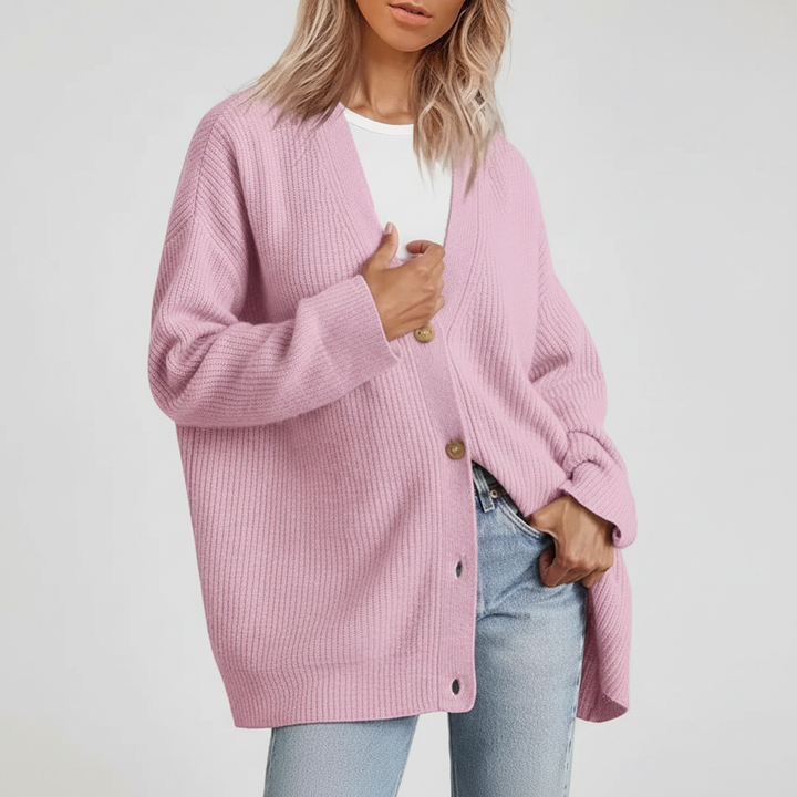 Dames kasjmier vest met diepe V-hals, losse pasvorm, elegant voor diverse gelegenheden.