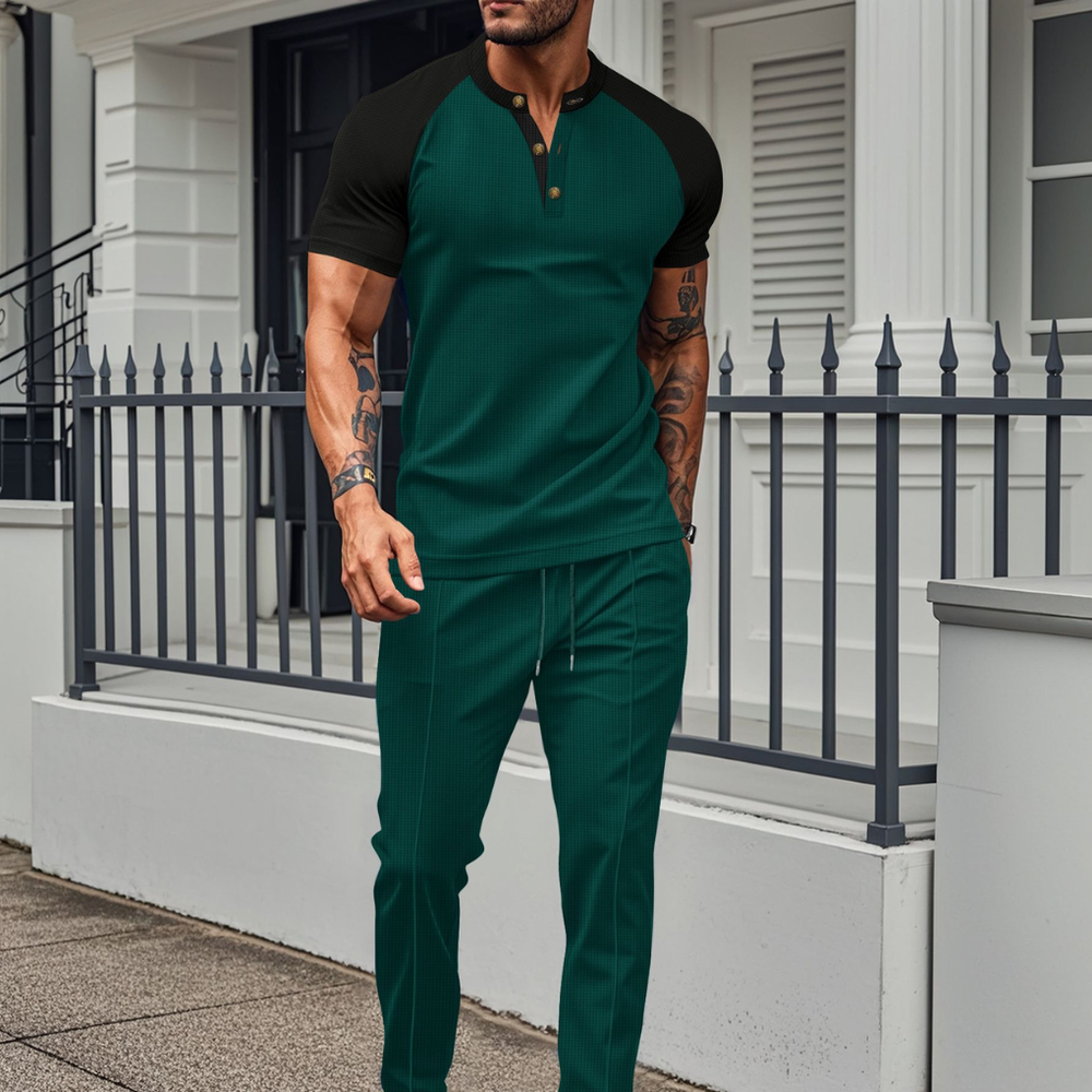 Modieus heren joggingpak; een casual outfit met stijlvol shirt en comfortabele joggingbroek voor dagelijks gebruik.