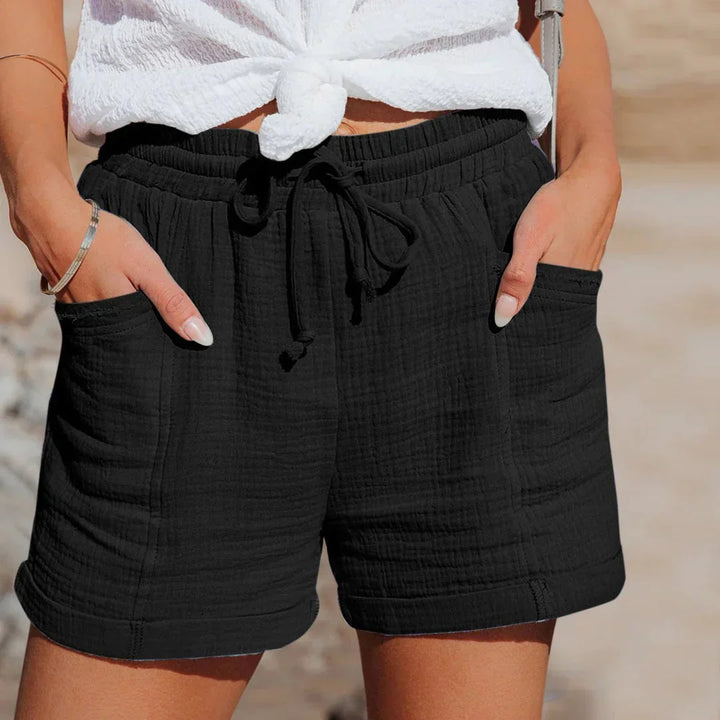 Luchtige dames zomer shorts met comfortabele elastische tailleband, ideaal voor casual vrijetijdskleding.