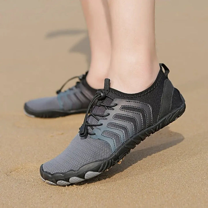 Ademende Jett wandelschoenen, unisex. Minimalistisch, flexibel en antislip voor diverse ondergronden.
