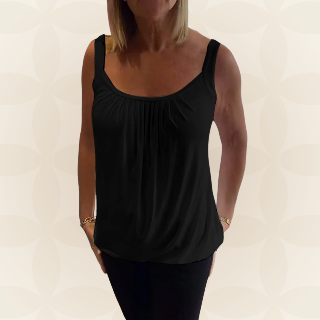 Heerlijke lentemode: mouwloze dames top met relaxte pasvorm en chique geplooide U-hals.