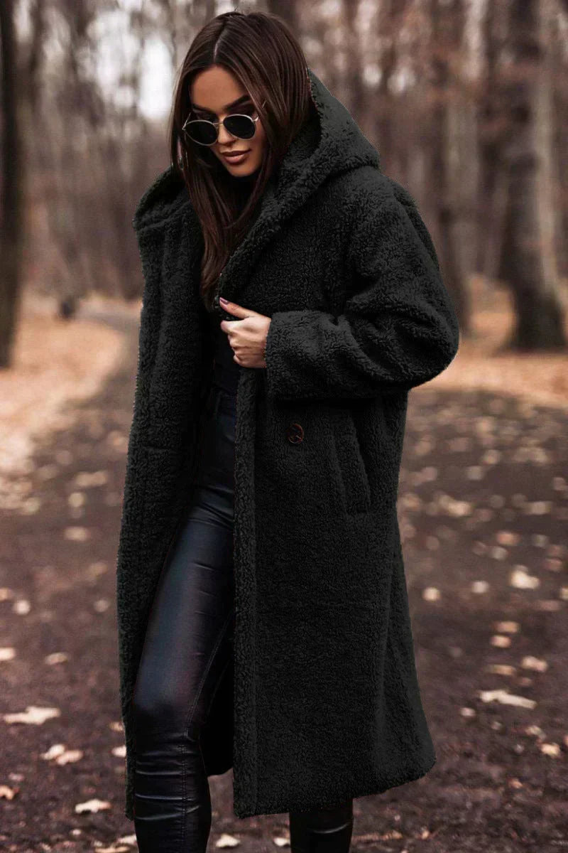 Zachte oversized dames teddyjas met capuchon, lange winterjas voor extra warmte en comfort. Modieuze outwear.