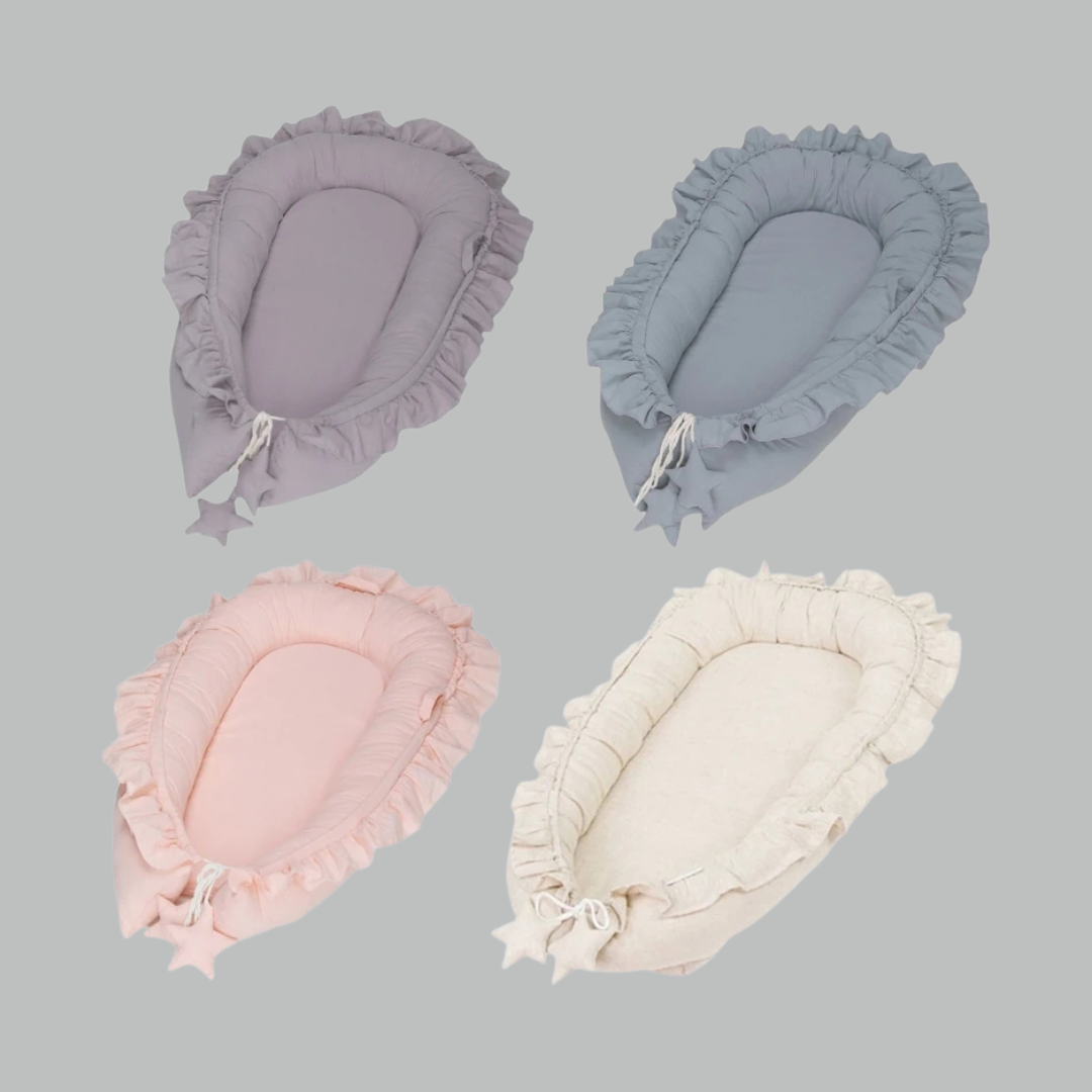 Zacht beige katoenen babynestje voor pasgeborenen, biedt geborgenheid en een comfortabele slaapplek. Ideaal als co-sleeper.
