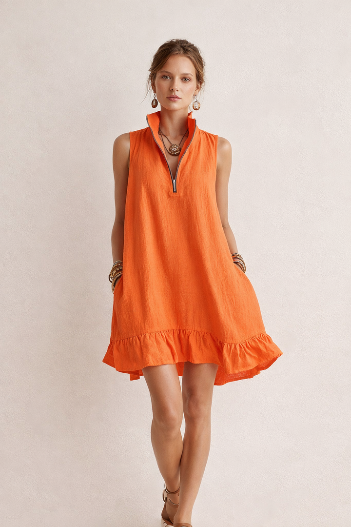 Dames zomerjurk mouwloos met ritssluiting, verkrijgbaar in roze, geel en oranje. Perfect voor casual vakantie.