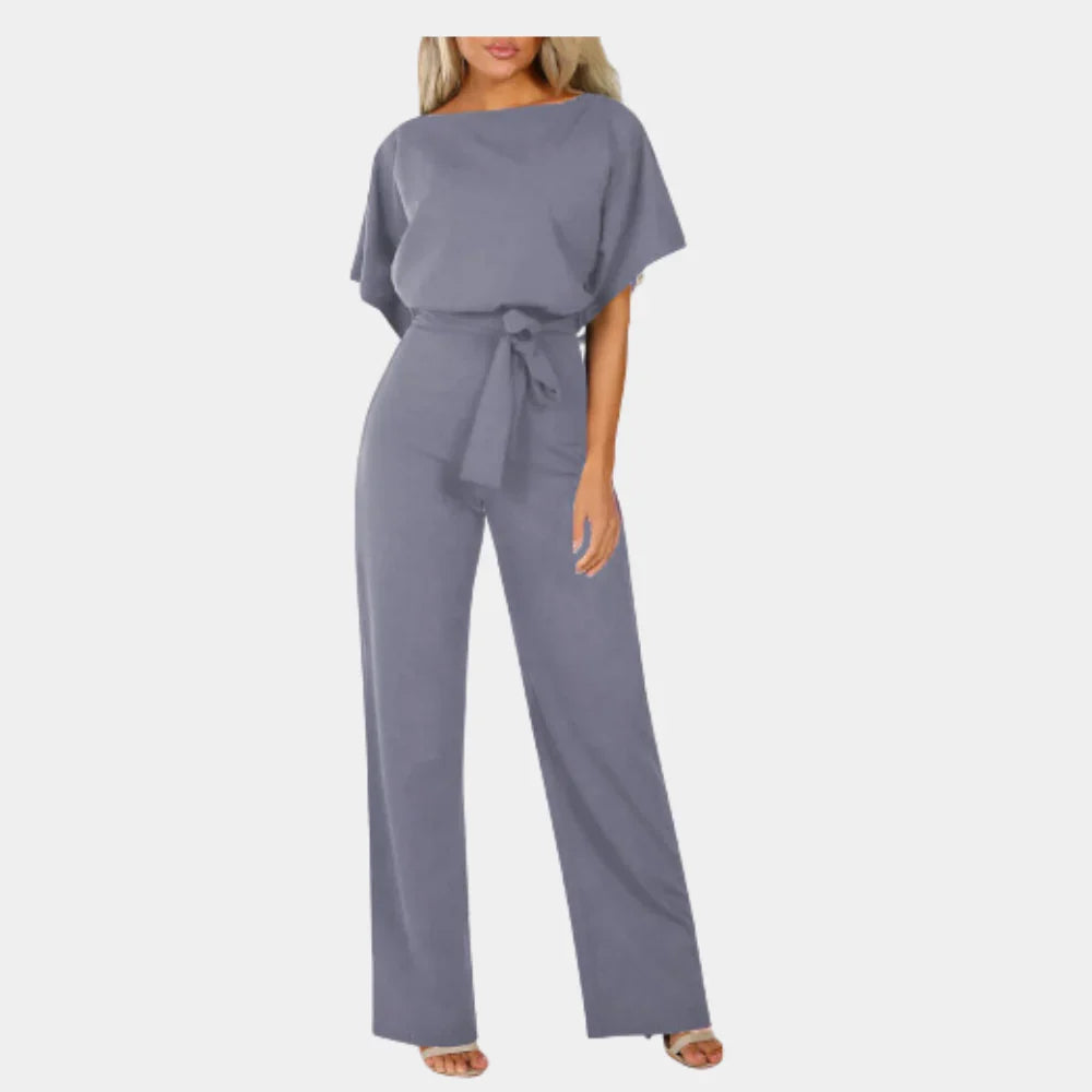 Lichtgewicht dames zomer jumpsuit met comfortabele wijde pijpen en een chic strikceintuur. Perfecte lentemode.