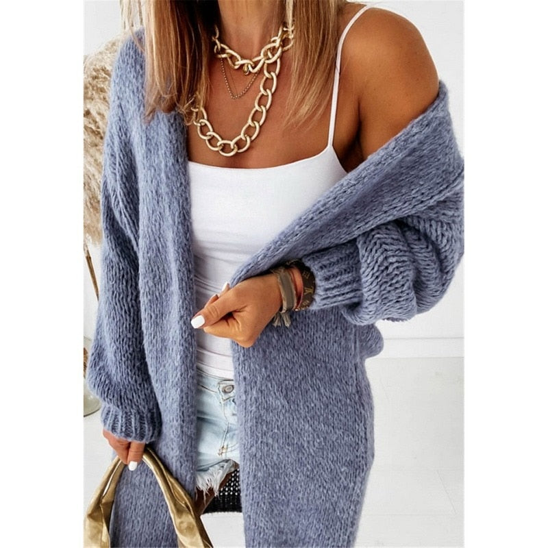 Modern gebreid damesvest, een stijlvolle aanvulling op elke outfit, van casual tot formeel.