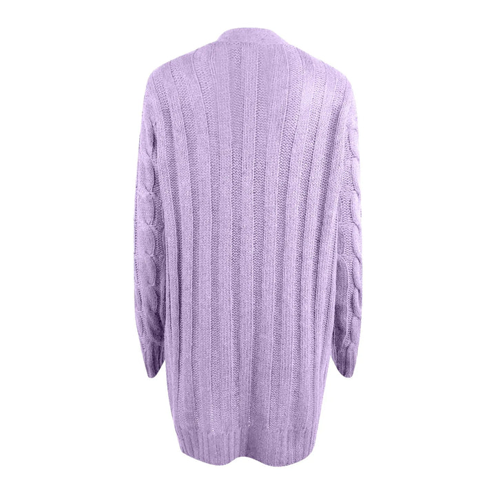 Detail van het gebreide damesvest, toont de zachte polyester textuur en stijlvolle afwerking.