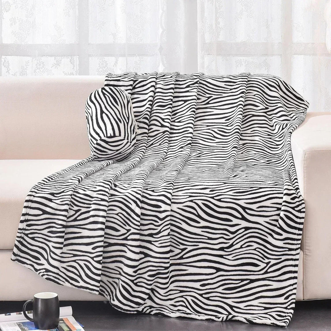 Comfortabele en warme fleece deken met luipaardpatroon, perfect als zacht plaid voor op de bank of bed.