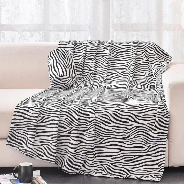 Comfortabele en warme fleece deken met luipaardpatroon, perfect als zacht plaid voor op de bank of bed.