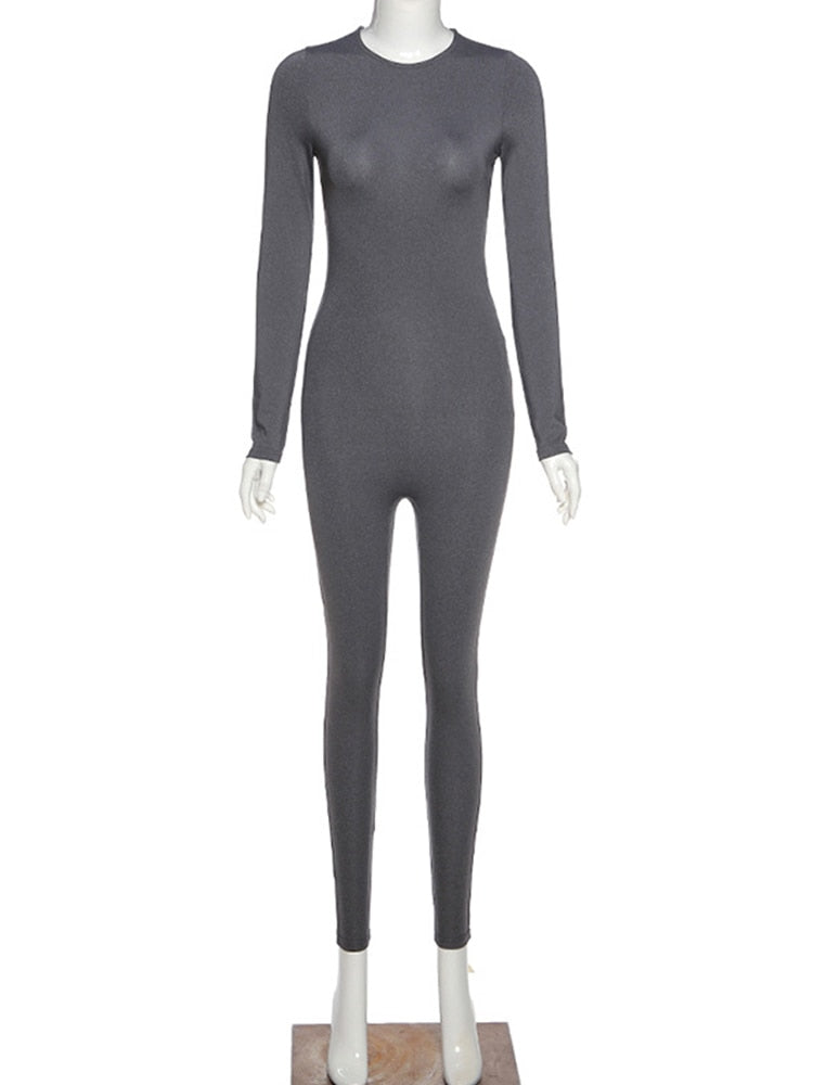 Ergonomische dames sportjumpsuit met lange mouw; optimale bewegingsvrijheid voor sport en workout.