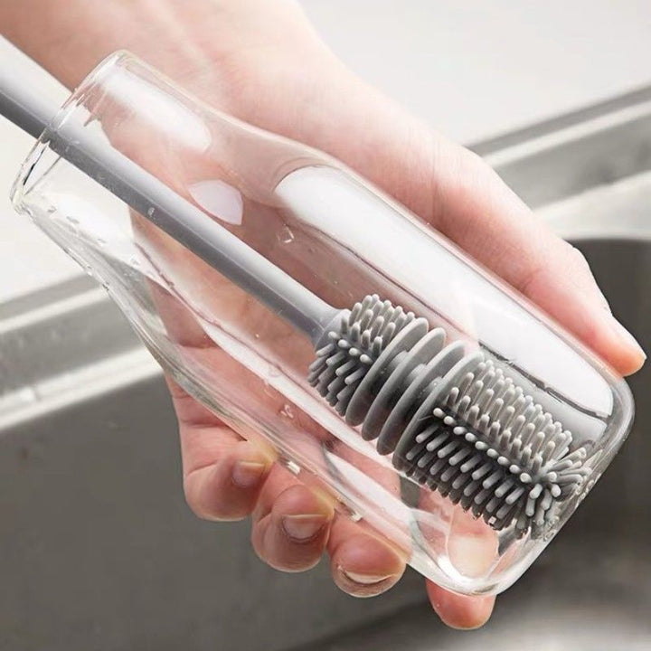 Vaatwasserbestendige siliconen afwasborstel voor flessen en glazen; voor een schone en hygiënische keuken.