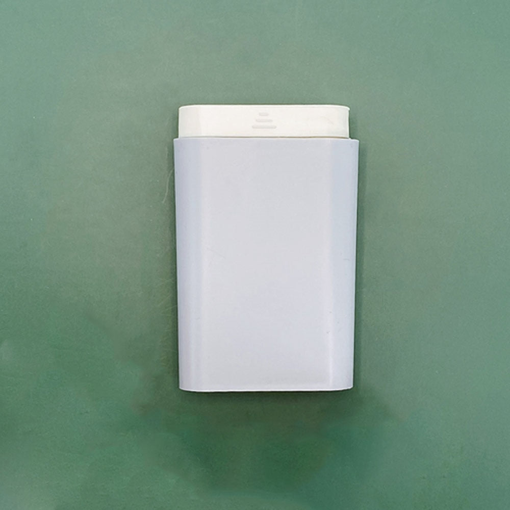 Groen compacte organizer, ideaal voor het sorteren van supplementen en medicatie.