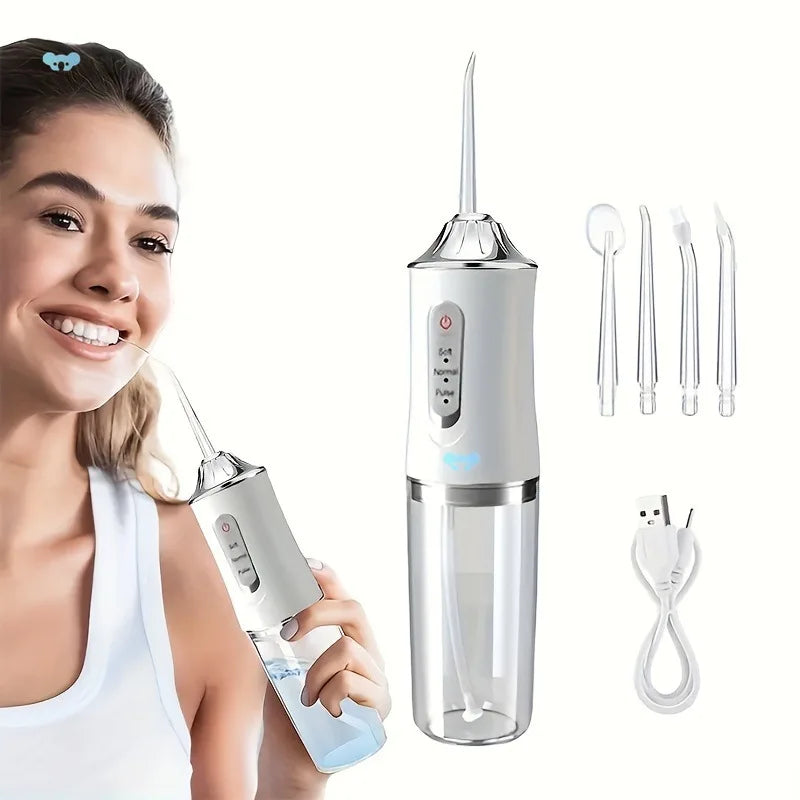 Witte draagbare monddouche en waterflosser met meerdere opzetstukken voor diepe mondreiniging.